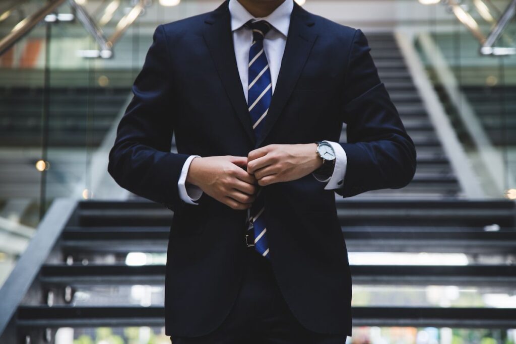 A man in a business suit.